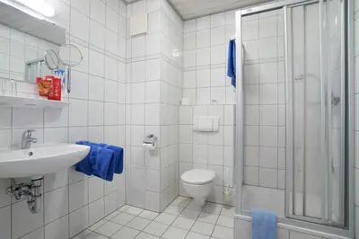 Ein Badezimmer in der Unterkunft Pension Martinus