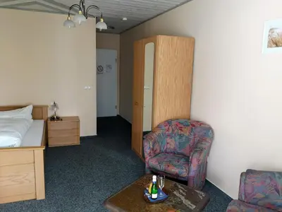 Ein Bett oder Betten in einem Zimmer der Unterkunft Pension Martinus