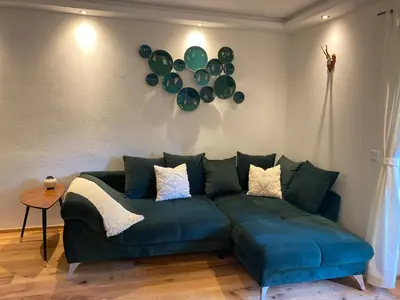 Ein Sitzbereich in der Unterkunft Ferienwohnung Räsl