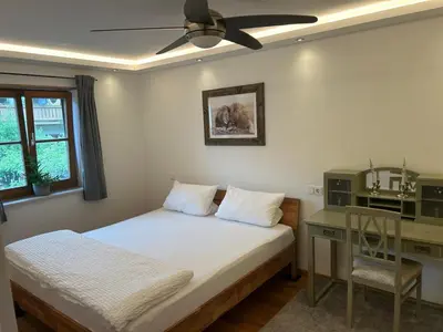 Ein Bett oder Betten in einem Zimmer der Unterkunft Ferienwohnung Räsl