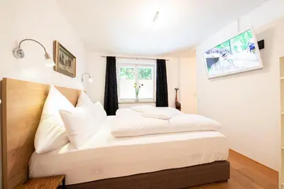 Ein Bett oder Betten in einem Zimmer der Unterkunft Ludwigschlössl