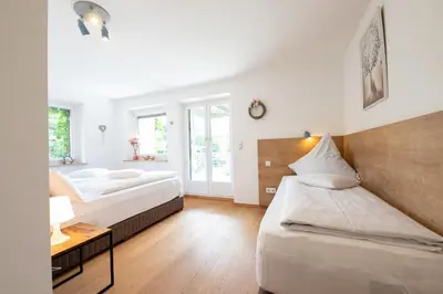 Ein Bett oder Betten in einem Zimmer der Unterkunft Ludwigschlössl