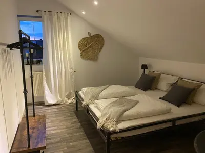 Ein Bett oder Betten in einem Zimmer der Unterkunft Im Herzen Bayerns