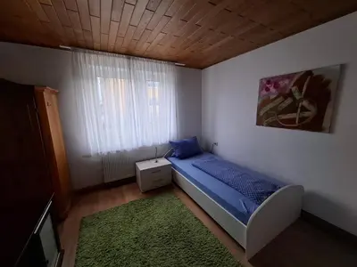 Ein Bett oder Betten in einem Zimmer der Unterkunft Haus - 4 Zimmer - 2 Bad - 1Küche, bis 8 Personen