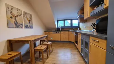 Küche/Küchenzeile in der Unterkunft Bunter Hirsch Ferienwohnung im Garmischer Zentrum