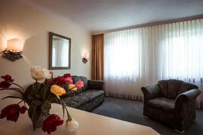 Ein Sitzbereich in der Unterkunft Hotel Limmerhof