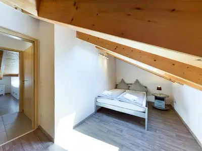 Ein Bett oder Betten in einem Zimmer der Unterkunft Bergspitzen