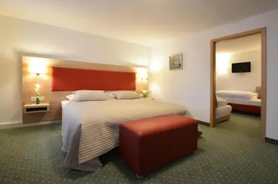 Ein Bett oder Betten in einem Zimmer der Unterkunft Hotel Haflhof