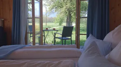 Ein Bett oder Betten in einem Zimmer der Unterkunft Niederauer Hof