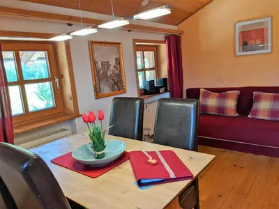 Ein Sitzbereich in der Unterkunft Niederauer Hof
