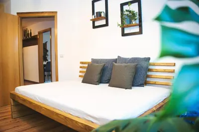 Ein Bett oder Betten in einem Zimmer der Unterkunft Apartment Bavaria - Zentral mit Stellplatz, Küche & Netflix