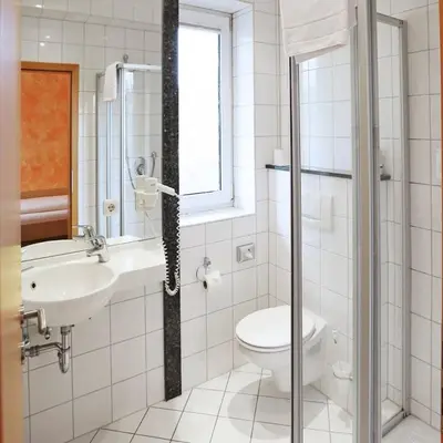 Ein Badezimmer in der Unterkunft Hotel Graf Lehndorff zur Messe