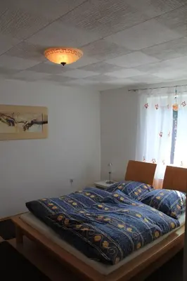 Ein Bett oder Betten in einem Zimmer der Unterkunft Ferienhaus Landsberg Am Lech