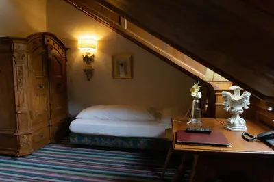 Ein Bett oder Betten in einem Zimmer der Unterkunft Hotel Schrenkhof