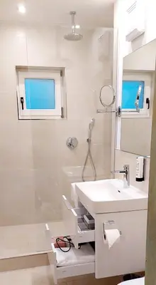 Ein Badezimmer in der Unterkunft Hotel Schrenkhof