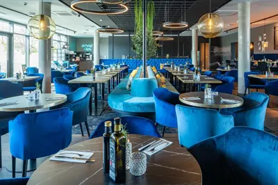 Ein Restaurant oder anderes Speiselokal in der Unterkunft Abasto Hotel Dachau