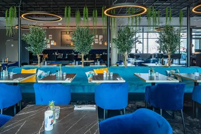 Ein Restaurant oder anderes Speiselokal in der Unterkunft Abasto Hotel Dachau