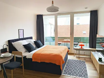 Ein Bett oder Betten in einem Zimmer der Unterkunft Studio Augsburg-Altstadt