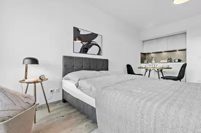 Ein Bett oder Betten in einem Zimmer der Unterkunft Studio Augsburg-Altstadt