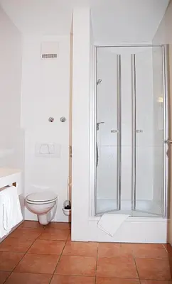Ein Badezimmer in der Unterkunft Hotel Isartaler Hof