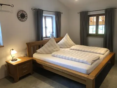 Ein Bett oder Betten in einem Zimmer der Unterkunft Chalet Hochgern