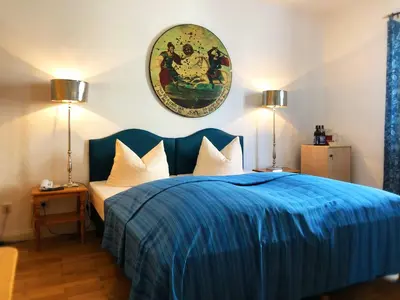 Ein Bett oder Betten in einem Zimmer der Unterkunft Hotel Mariahilf München