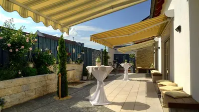 Ein Restaurant oder anderes Speiselokal in der Unterkunft Hotel Gasthof Lachner