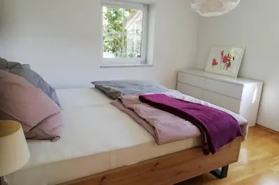 Ein Bett oder Betten in einem Zimmer der Unterkunft FeWo Happy Place in traumhafter Lage See nah