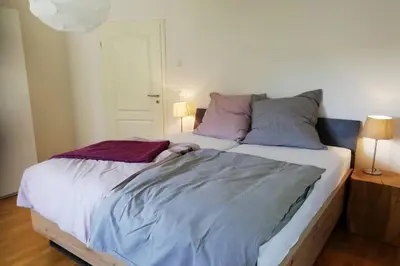 Ein Bett oder Betten in einem Zimmer der Unterkunft FeWo Happy Place in traumhafter Lage See nah