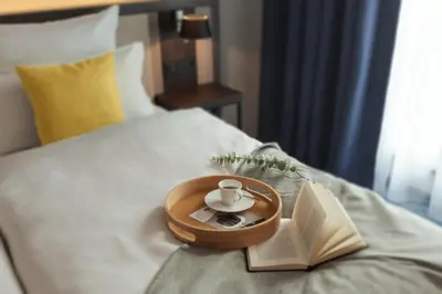 Ein Bett oder Betten in einem Zimmer der Unterkunft Candlewood Suites Augsburg by IHG