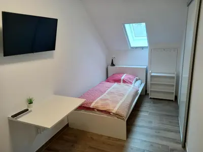 Ein Bett oder Betten in einem Zimmer der Unterkunft Heimatliebe Bruckmaier