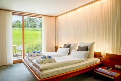 Ein Bett oder Betten in einem Zimmer der Unterkunft Marina Hotel am Starnberger See