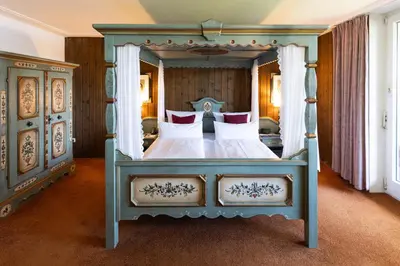 Ein Bett oder Betten in einem Zimmer der Unterkunft Marina Hotel am Starnberger See