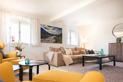 Ein Sitzbereich in der Unterkunft Ferienhaus BERGEBLICK DELUXE