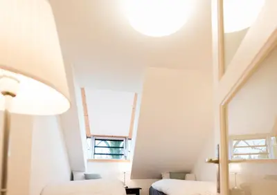 Ein Bett oder Betten in einem Zimmer der Unterkunft Ferienhaus BERGEBLICK DELUXE