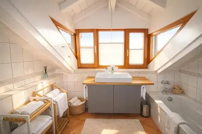 Ein Badezimmer in der Unterkunft ChiemseeRefugium - Ferienwohnung Park