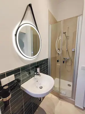 Ein Badezimmer in der Unterkunft HOMELY STAY Studio 1 - Small and cozy Self-Check-In Room in Munich
