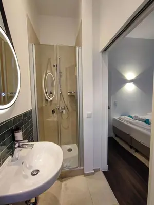 Ein Badezimmer in der Unterkunft HOMELY STAY Studio 1 - Small and cozy Self-Check-In Room in Munich