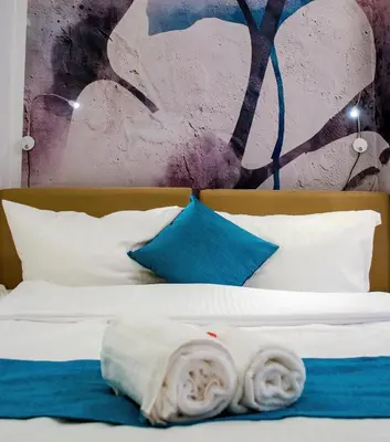 Ein Bett oder Betten in einem Zimmer der Unterkunft HOMELY STAY Studio 1 - Small and cozy Self-Check-In Room in Munich