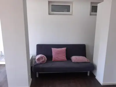 Ein Sitzbereich in der Unterkunft Luxuriöse Wohnung mit eigenem Garten