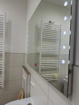 Ein Badezimmer in der Unterkunft Luxuriöse Wohnung mit eigenem Garten