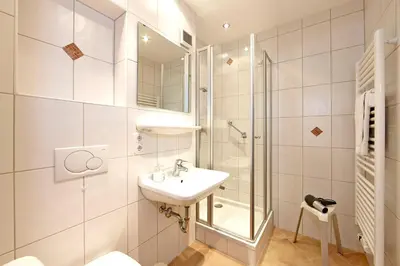 Ein Badezimmer in der Unterkunft Alpenkette