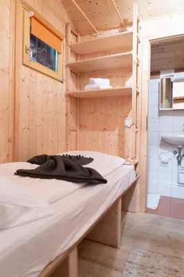 Ein Bett oder Betten in einem Zimmer der Unterkunft Romantisches Berg-Chalet