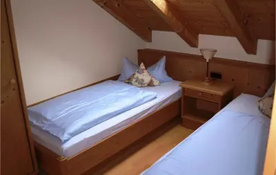 Ein Bett oder Betten in einem Zimmer der Unterkunft Amazing Apartment In Oberaudorf