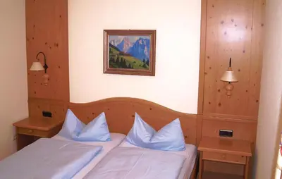 Ein Bett oder Betten in einem Zimmer der Unterkunft Awesome Apartment In Oberaudorf