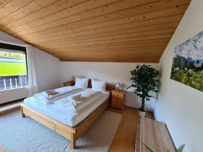 Ein Bett oder Betten in einem Zimmer der Unterkunft Schönes Ferienhaus am Herrenberg