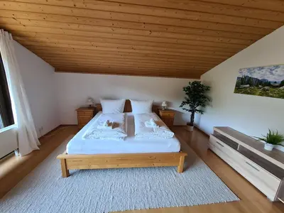 Ein Bett oder Betten in einem Zimmer der Unterkunft Schönes Ferienhaus am Herrenberg