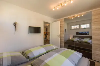 Ein Bett oder Betten in einem Zimmer der Unterkunft Ferienwohnung Blickfang
