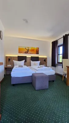 Ein Bett oder Betten in einem Zimmer der Unterkunft Der Blankhof 