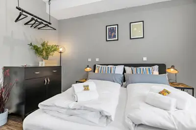 Ein Bett oder Betten in einem Zimmer der Unterkunft LUXOMES - Modern Design Apartments - Ingolstadt Central